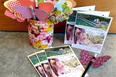 Schmetterlings-Quizpass für Kinder mit kleinen Geschenken | © Tourismusverband Uttendorf / Weißsee